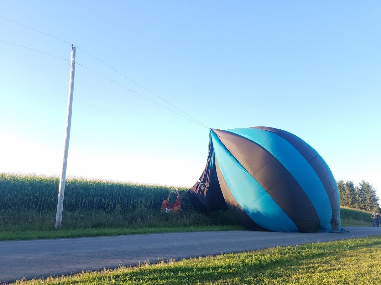 Hot air balloon meets power lines